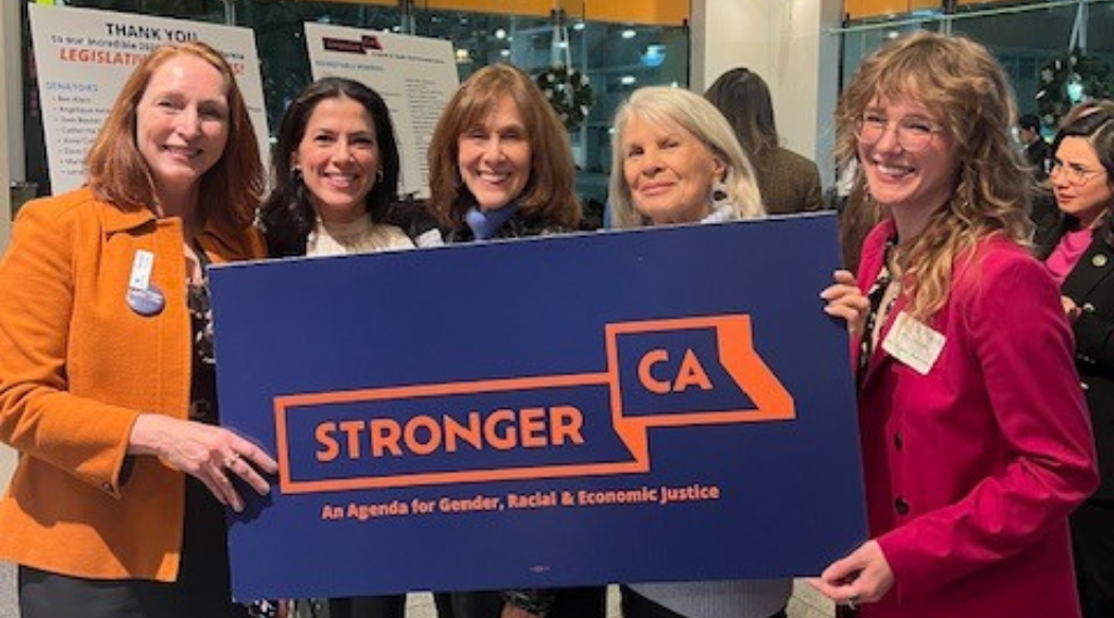 Group photo of five women holding a sign that says "Stronger California"